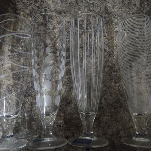 Never used  lot of 8 Mikasa glasses wine and flutes